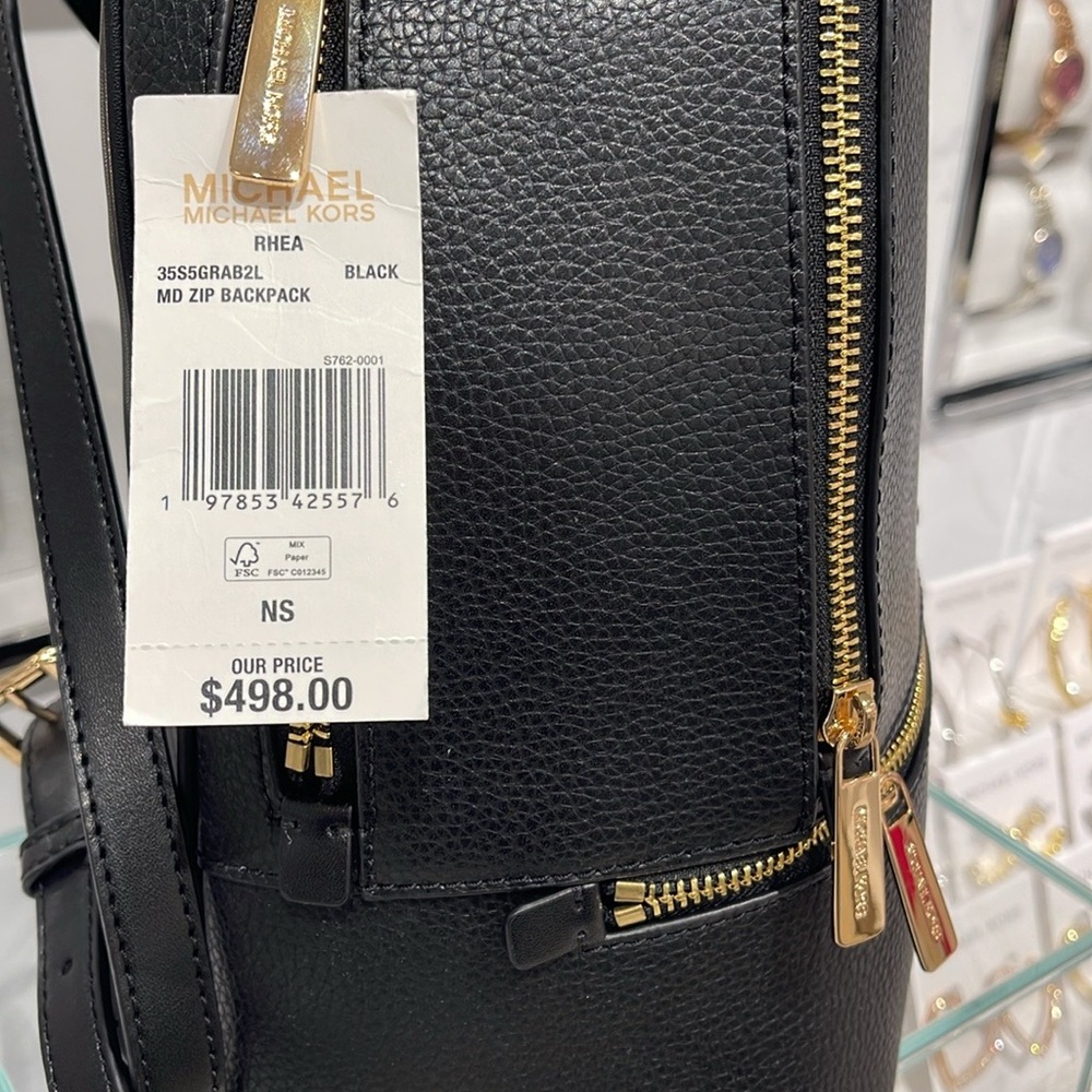 Michael Kors Rhea Medium Pebbled Leather Backpack
Black 
NWT - Picture 7 of 16